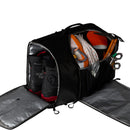 A Great Outdoors Base Camp Boot Bag in black stands unzipped, displaying hiking boots, coiled rope, carabiners, belay devices, and neatly organized orange climbing helmets inside.
