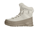 The North Face Womens ThermoBall Leather Waterproof Boot is a beige winter boot featuring a thick sole, suede upper, fleece lining, and lace-up front—crafted for warmth and outdoor wear.