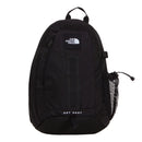 A black The North Face Hot Shot Sling Bag featuring HOT SHOT printed at the bottom, a top handle, front webbing, side mesh pocket, and the brand logo displayed near the top—this versatile design seamlessly blends classic style with practical functionality.