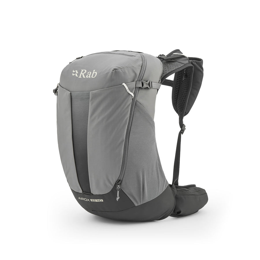 A Rab Airox ND22L Day Pack in grey, designed for women, featuring multiple compartments, padded shoulder straps, and a ventilated AEROFIT back system for enhanced comfort, is displayed upright against a white background.