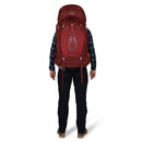 Osprey Aura AG 65 Backpack worn, full length front, Berry Sorbet