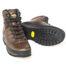Meindl Bhutan leather hiking boot pair showing sole on one and the front of another on a white background.