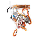 A climbing harness loaded with various climbing and safety gear, including orange and silver carabiners, a red and white rope, and a blue belting, displayed against a solid white background.
