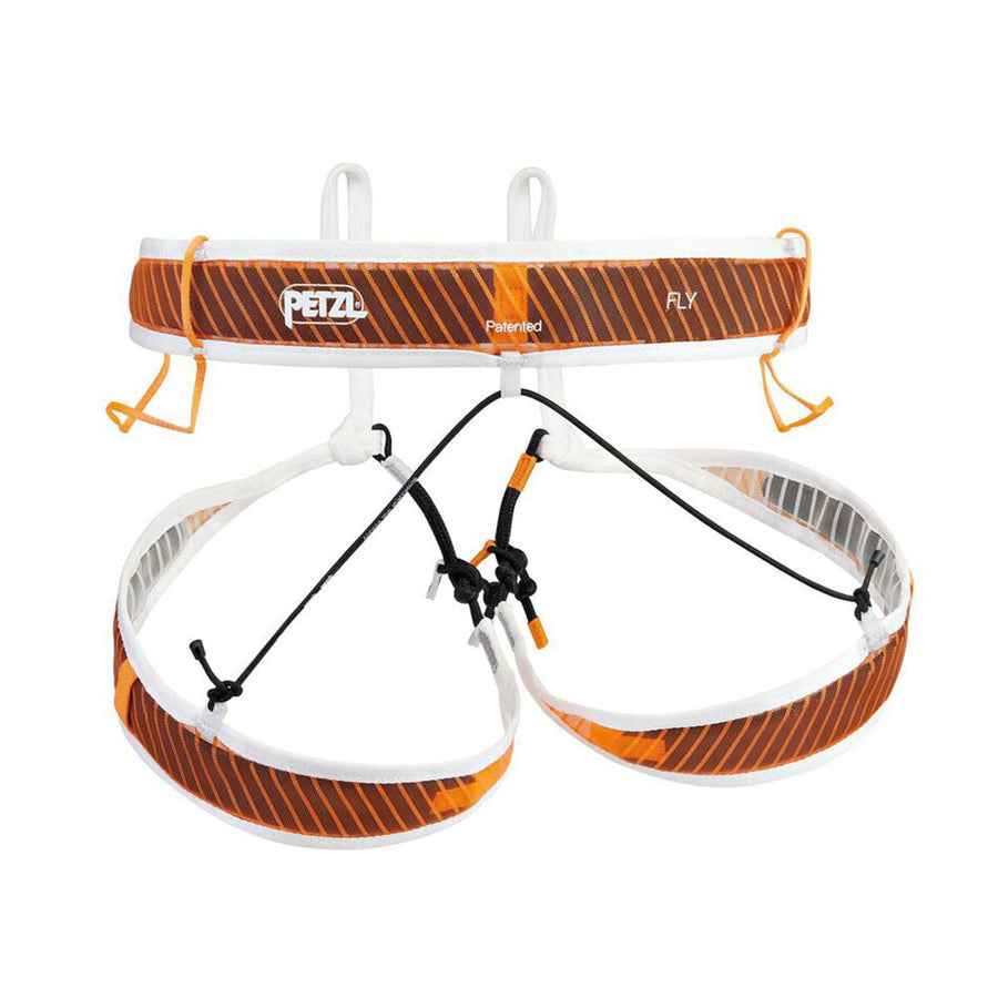Orange and white climbing harness with 'Petzl' branding on a white background