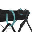 Close-up of a black harness belt with teal loops on a white background