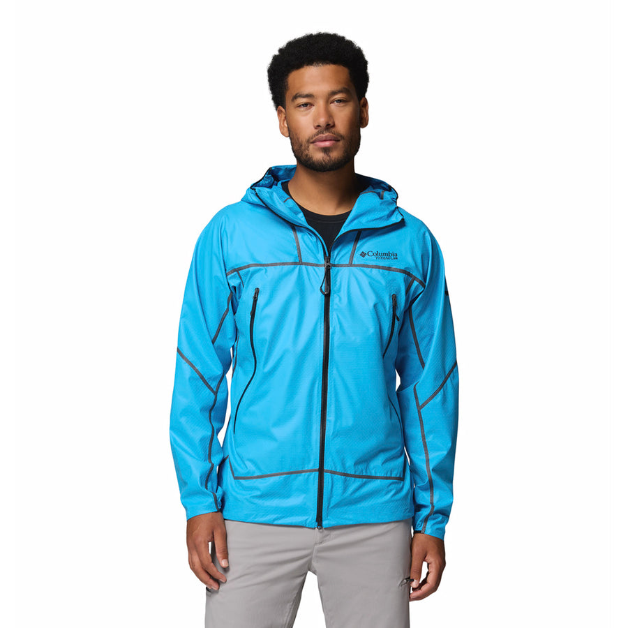Man wearing a blue Cassiar Pro jacket with Columbia logo on a white background