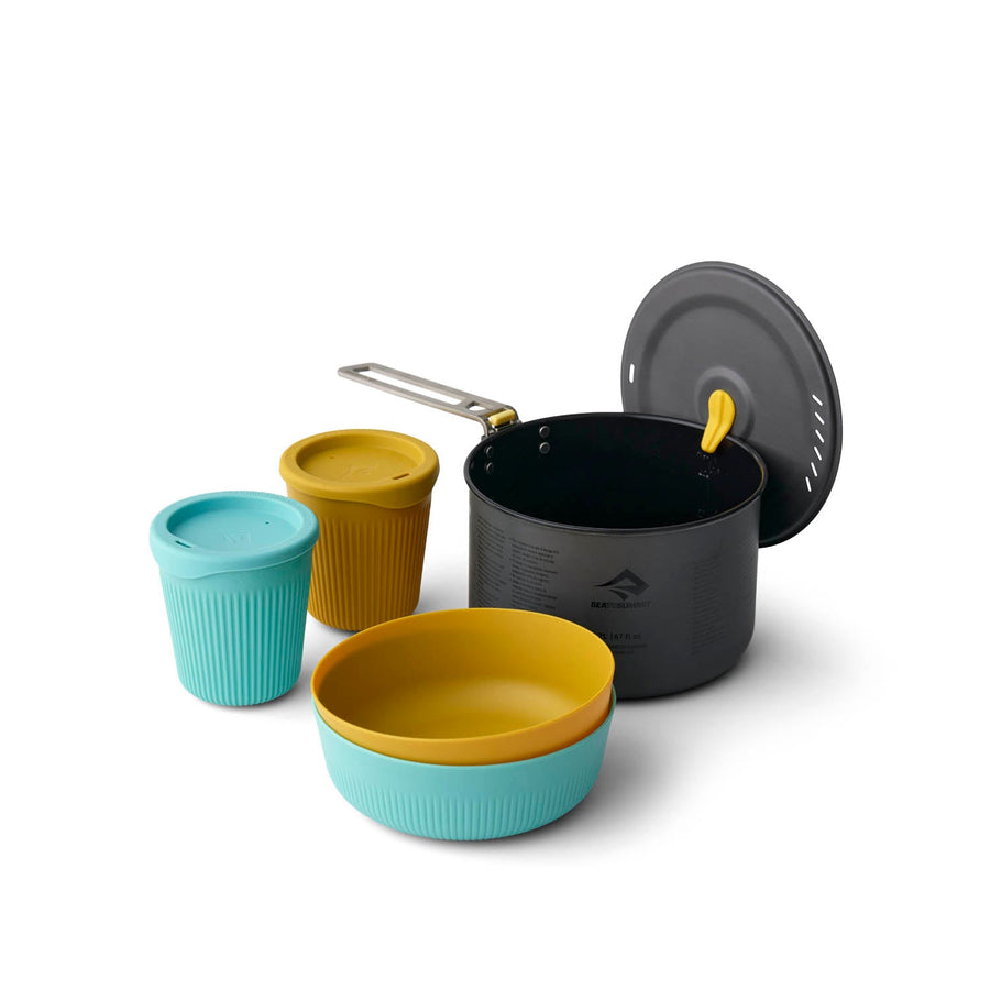 The Sea to Summit Frontier Ultralight One Pot Cook Set 2L (5-Piece) includes a gray ceramic non-stick camping pot with a matching lid, two lidded cups (one blue, one yellow), and two bowls (one blue, one yellow), all neatly nested together on a white background—ideal for your next ultralight adventure.