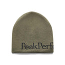 The PP Hat by Peak Performance is an olive green beanie crafted from 100% acrylic, featuring a double-layer knit construction and the partially visible text PeakPerf in black near the bottom edge, shown against a white background.