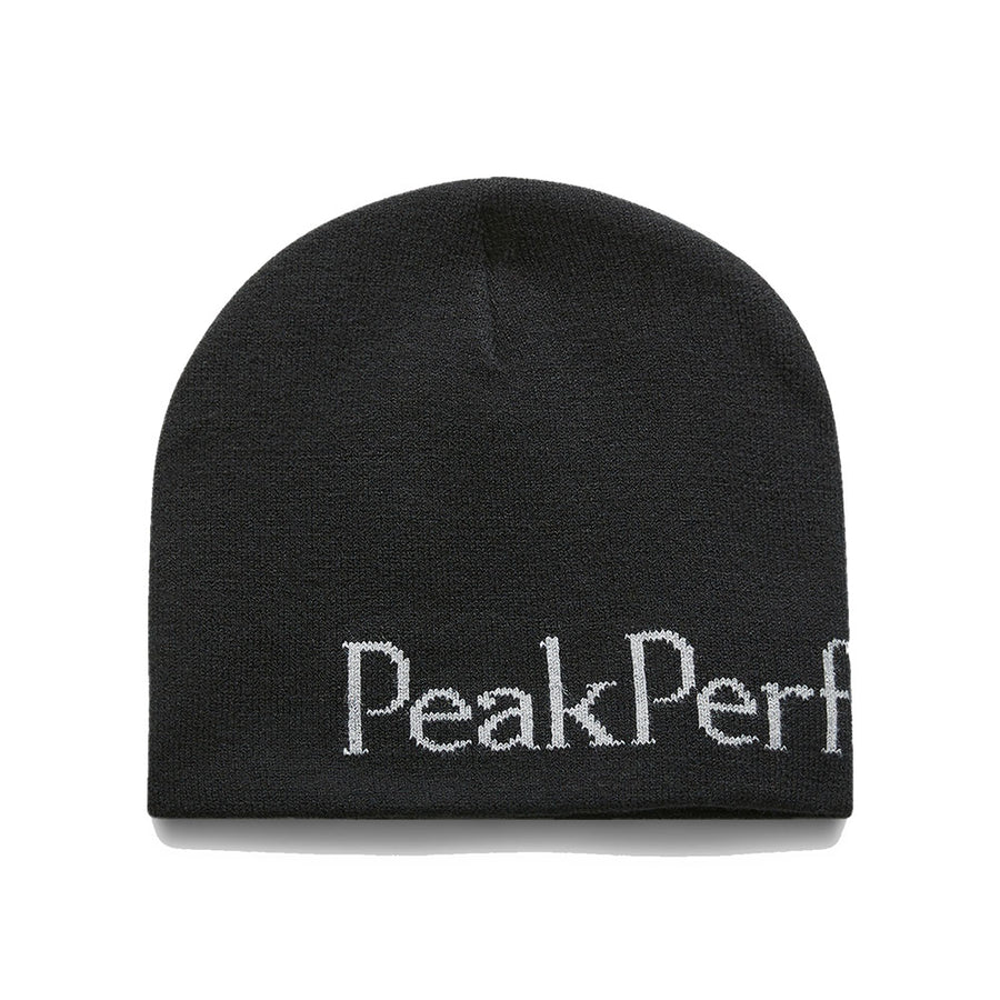 The Peak Performance PP Hat is a black beanie made from 100% acrylic, featuring a double-layer knit design and partially visible white PeakPerf text along the front bottom edge.