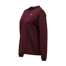 The Womens Trail Polartec Power Grid Crew Fleece by Peak Performance is a maroon long-sleeve crewneck sweatshirt featuring a subtle textured pattern and a small embroidered logo on the left chest, shown against a white background. Inspired by the comfort of an outdoor pullover, this fleece utilizes Polartec Power Grid fabric for enhanced warmth and breathability.