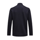Back view of the Peak Performance Mens Trail Polartec Power Grid Half Zip Fleece, a long-sleeve, dark-colored technical midlayer shown on a plain white background. The garment features a collar and clean design with no visible logos, crafted from subtle, high-performance Polartec Power Grid fabric for enhanced comfort and versatility.