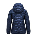 The Peak Performance Womens Helium Down Hood Jacket in navy blue is shown from the back, featuring horizontal, wave-like quilted stitching. This lightweight, packable jacket is designed with a windproof and water-repellent shell for comfort and protection.