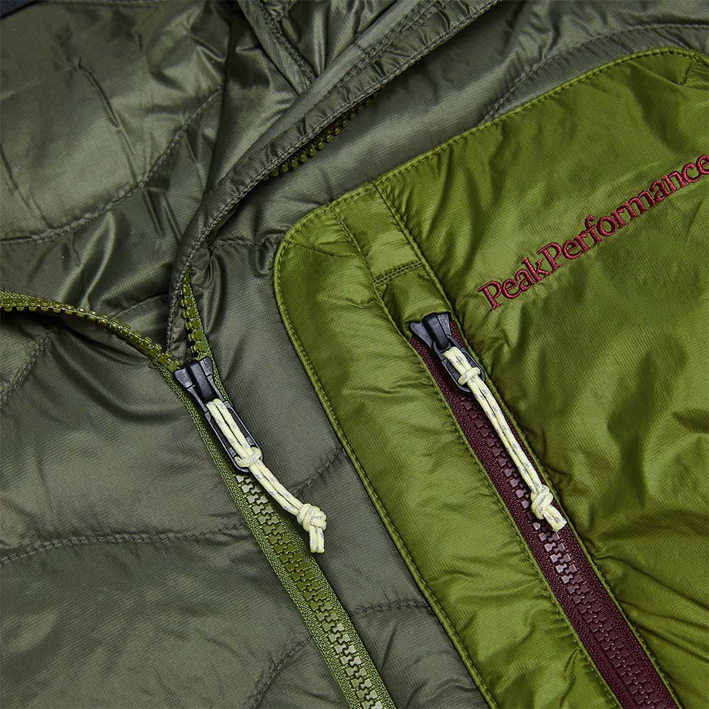 Olive green quilted hooded Men’s Helium Utility Down Hood Jacket with a zippered chest pocket and matching zippers.