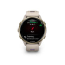 Garmin Forerunner® 970 - Soft Gold Titanium, French Grey Case with French Grey/Indigo Band  