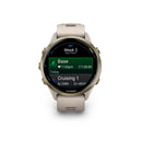 Garmin Forerunner® 970 - Soft Gold Titanium, French Grey Case with French Grey/Indigo Band  
