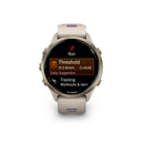 Garmin Forerunner® 970 - Soft Gold Titanium, French Grey Case with French Grey/Indigo Band  