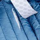 Gear Aid Tenacious Tape Repair Tape on a tear in a sleeping bag or down jacket quilted lining.