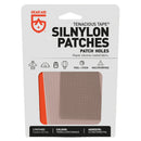 Durable Gear Aid Tenacious Tape Silnylon Patch with waterproof silicone coating. Compact and reliable for outdoor gear repairs.