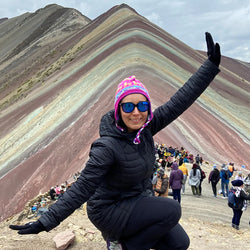 Gabriele Bernal is the surpervisor of Great Outdoors partner Columbia Store on Trinity street, whereas here, she's walking on the candy striped hills of Pitumarca, Peru
