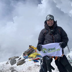 A picture of Great Outdoors Owner and Director Ken Costigan at the top of Mount Elbrus 