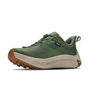 The Hoka Mens Transport 2 in green is a versatile city-to-trail running shoe featuring a durable, textured upper and thick sustainable cushioning in the sole. For optimal traction, it boasts a brown rubber outsole with a black-and-orange Vibram logo on the side. Additional details include a convenient heel loop for easy on and off.