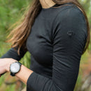 Icebreaker Women's Merino 200 Oasis Thermal Top worn outdoors, lifestyle picture