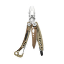Leatherman Skeletool CX in Sandstone  colourway on a white background. It is opened with the main blade, screwdriver bit, pliers and carabiner all visible.