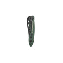 A closed green and black Leatherman Skeletool® KB Knife is shown vertically against a white background, featuring cutout handle holes and visible LEATHERMAN Skeletool KB branding on the side.