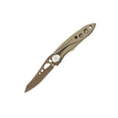 The Leatherman Skeletool® KB Knife is a folding EDC knife with a metallic handle engraved with the brand name and holes for lightness, plus a partially serrated 420HC stainless steel blade that also features holes for reduced weight.