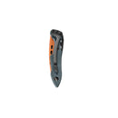 A closed Leatherman Skeletool® KBx Knife with an orange and black handle and metal clip is shown vertically against a white background—ideal for everyday carry.