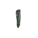 A compact, green and black Leatherman Skeletool® KBx Knife in closed position with visible brand name and cutout handle holes, centered on a white background. Features a 420HC stainless steel blade for everyday carry.