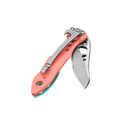 The Leatherman Skeletool® KBx Knife features a pink handle, metal pocket clip, and 420HC stainless steel blade with thumb hole, shown partially opened on a white background. Ideal for everyday carry.