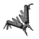 A Leatherman Surge Multitool in black, shown open at an angle against a white background, features pliers, knives, screwdrivers, scissors, a blade exchanger, and a bottle opener.