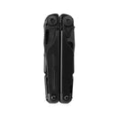 A closed black Leatherman Surge Multitool stands vertically against a plain white background, displaying the brand and model name as well as its signature blade exchanger engraved on the handle.