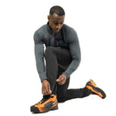 Men's Ibex Mountain Pant ankle gaiter and boot detail, Anvil Grey/Black