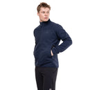 A person wearing the Mountain Equipment Men’s Jorasses Lite Fleece Jacket in navy and black pants stands with hands in pockets, looking to the side against a plain white background.