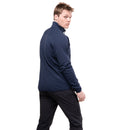 A man wearing the Mountain Equipment Men’s Jorasses Lite Fleece Jacket in navy and black pants stands sideways, looking back over his shoulder against a white background.