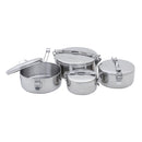 Four MSR Alpine StowAway Pots with clamp locks and lids are arranged together; they come in different sizes and shapes, all featuring a polished stainless steel finish. Ideal for camping cookware, these durable MSR pots serve as both secure food storage containers and reliable vessels for heating meals outdoors or at home.