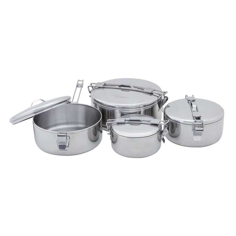 Four MSR Alpine StowAway Pots with clamp locks and lids are arranged together; they come in different sizes and shapes, all featuring a polished stainless steel finish. Ideal for camping cookware, these durable MSR pots serve as both secure food storage containers and reliable vessels for heating meals outdoors or at home.
