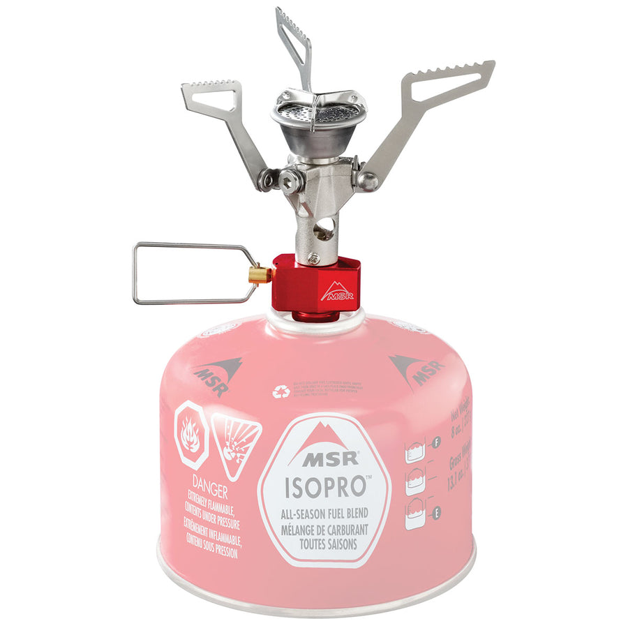The MSR PocketRocket 2 Stove is a portable and compact camping stove that features a durable metal burner attached to a red and white MSR IsoPro fuel canister. Designed for ultralight backpacking, this stove has foldable arms and an adjustable flame valve, making it perfect for quickly boiling meals during your outdoor adventures.