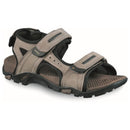 The Meindl Capri Unisex Walking Sandal features adjustable Velcro straps, a cushioned footbed, and a rugged rubber sole for comfort and durability—drawing inspiration from Meindl’s iconic hiking shoes.