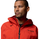 A man wearing a Columbia Mens Saudan Pro™ 3L Shell Jacket in bright red with a hood, featuring Omni-Tech Pro waterproofing, looks off to the side from the chest up against a white background.