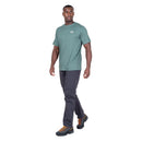 Model wearing Men’s Podus Tee green walking