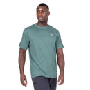 Model wearing Men’s Podus Tee green front walking