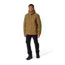 A man wearing a brown Rab Mens Microlight Shield Waterproof Down Jacket, black pants, and black hiking boots stands smiling against a white background.