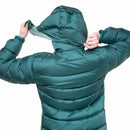 Model wearing green down jacket, back view with hood up