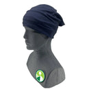 A gray mannequin head and shoulders, shown in profile, wears the Great Outdoors Ireland Multifunctional Bandana - Navy Solid as a headscarf. A green and white pin on its chest highlights the bandana’s advanced moisture management features.