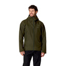 A man wearing the Rab Mens Namche GTX Waterproof Jacket in dark green and black pants stands against a white background, smiling and looking slightly to his left.