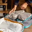 Osprey Daylite Packing Cube Set inside open backpack, lifestyle shot
