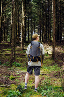 Osprey Talon Velocity 30 Backpack worn outdoors, lifestyle picture